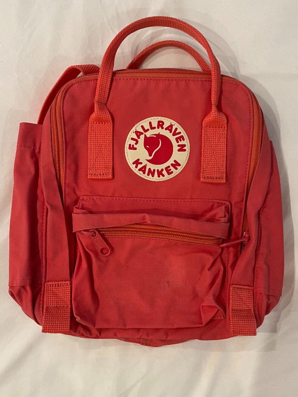 Watermelon colored Fjallraven Mini Backpack